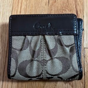 Brown patent coach wallet